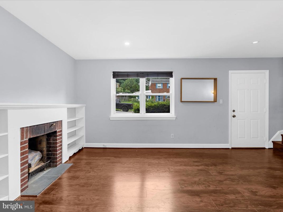 Empty room, Fireplace, Interior, Recessed Lighting, Wood Texture Flooring