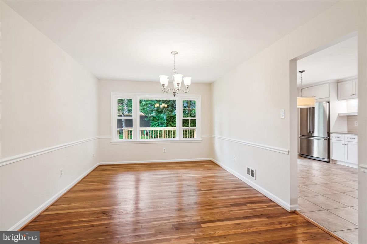 Chandelier, Empty room, Interior, Kitchen, Pendant Lights, Stainless Steel Appliances, Wood Texture Flooring