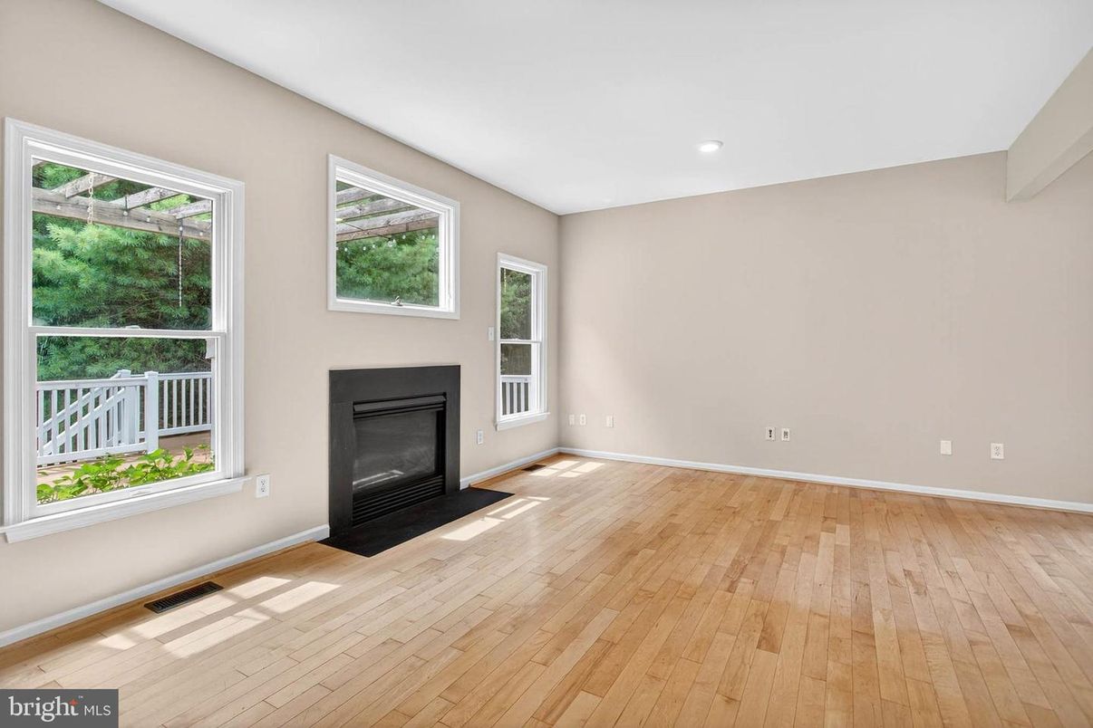 Empty room, Fireplace, Interior, Recessed Lighting, Wood Texture Flooring