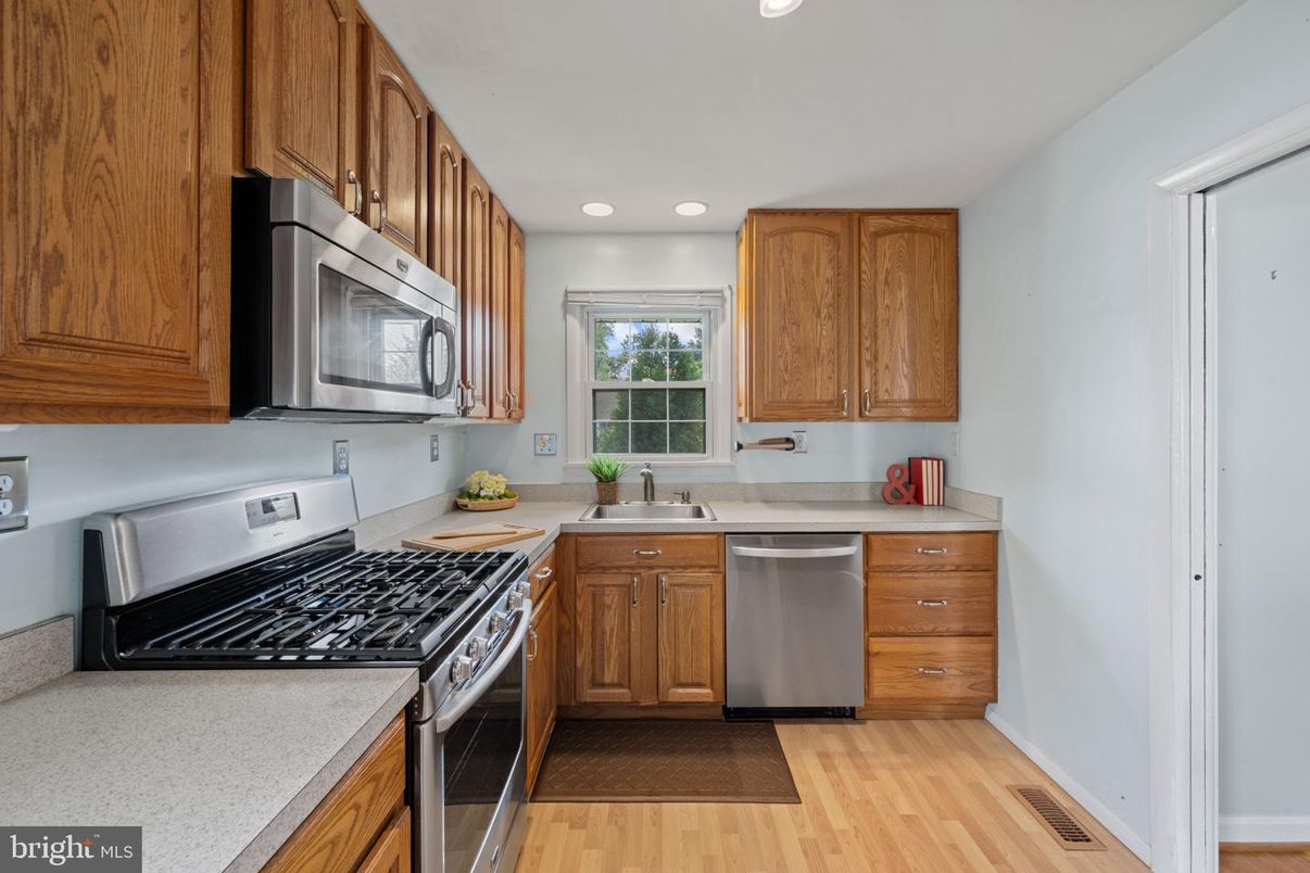 Interior, Kitchen, Recessed Lighting, Stainless Steel Appliances, Wood Texture Flooring