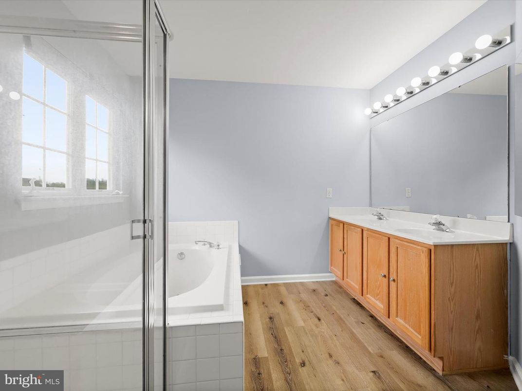 Bathroom, Dual Sink Vanities, Glass Shower, Interior, Wood Texture Flooring