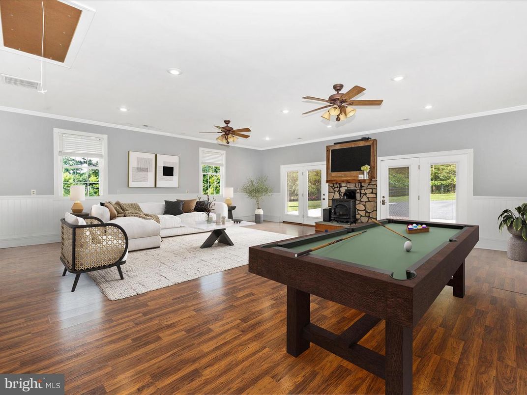 Billiard Table, Fireplace, Game Room, Interior, Living room, Recessed Lighting, Wood Texture Flooring