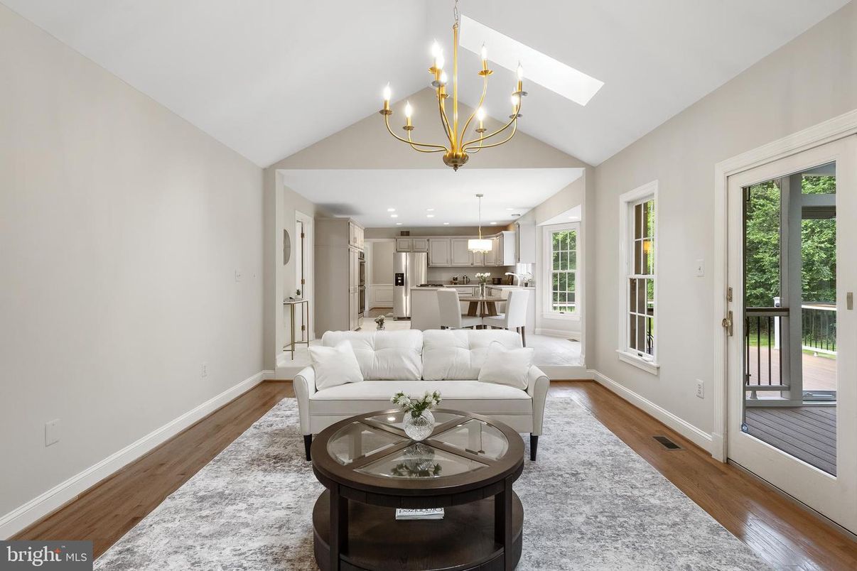 Chandelier, Dining room, Interior, Kitchen, Living room, Pendant Lights, Stainless Steel Appliances, Wood Texture Flooring
