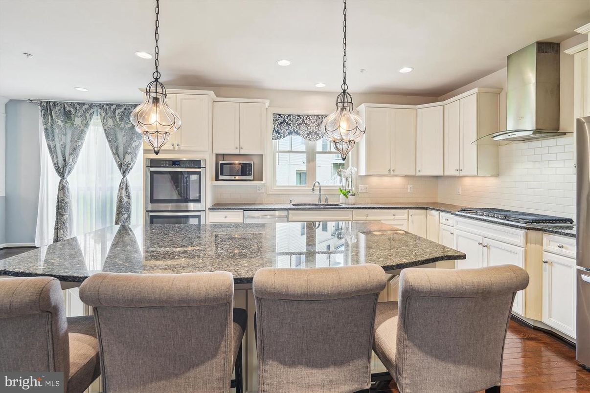 Chandelier, Interior, Kitchen, Pendant Lights, Recessed Lighting, Stainless Steel Appliances, Wood Texture Flooring