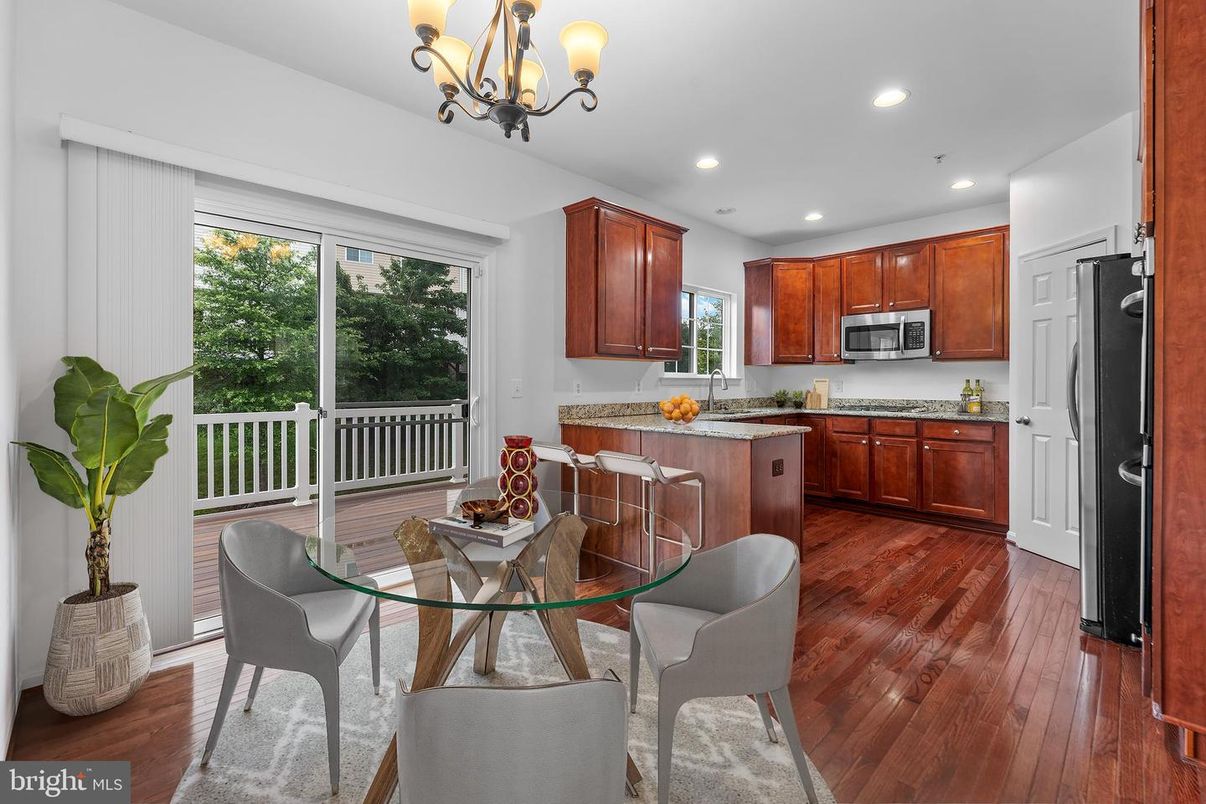 Chandelier, Dining room, Interior, Kitchen, Recessed Lighting, Stainless Steel Appliances, Wood Texture Flooring
