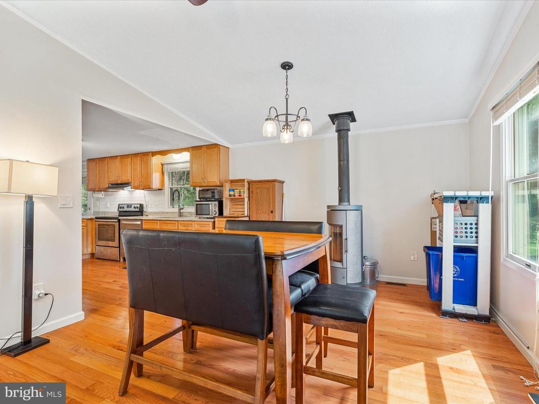 Fireplace, Interior, Kitchen, Pendant Lights, Stainless Steel Appliances, Wood Texture Flooring