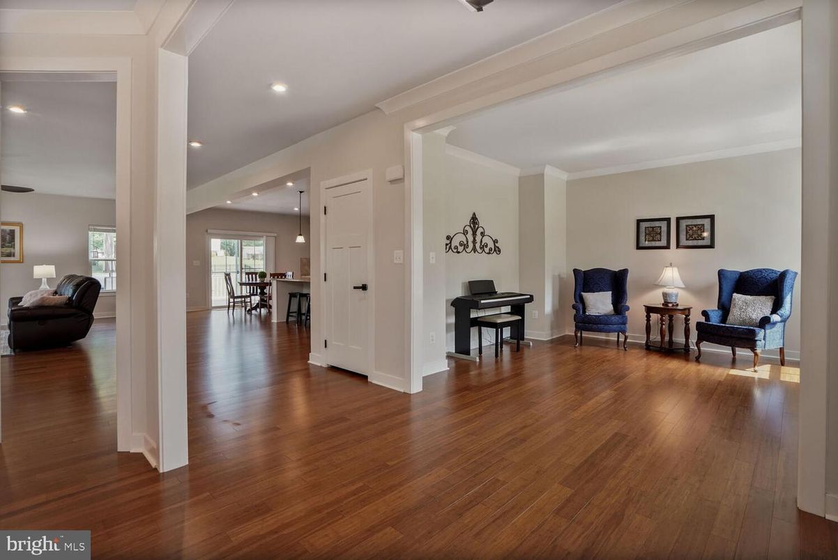 Dining room, Interior, Living room, Pendant Lights, Piano, Recessed Lighting, Wood Texture Flooring
