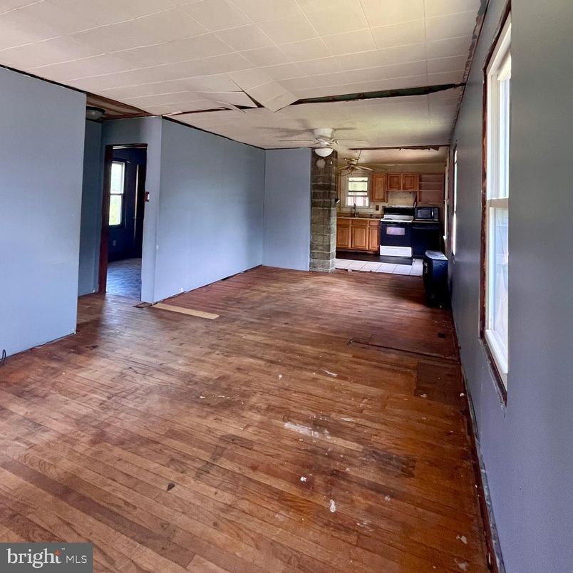 Empty room, Interior, Kitchen, Stainless Steel Appliances, Wood Texture Flooring