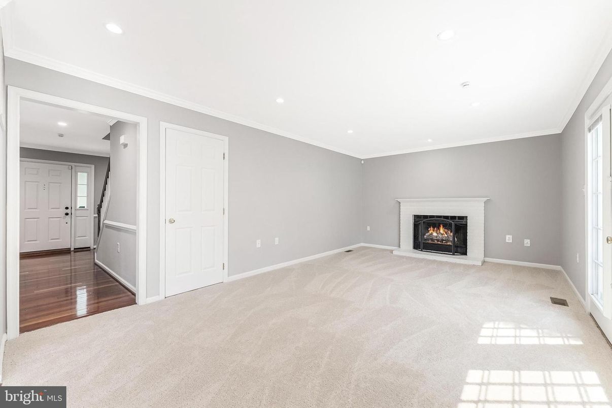 Empty room, Fireplace, Interior, Recessed Lighting, Wood Texture Flooring