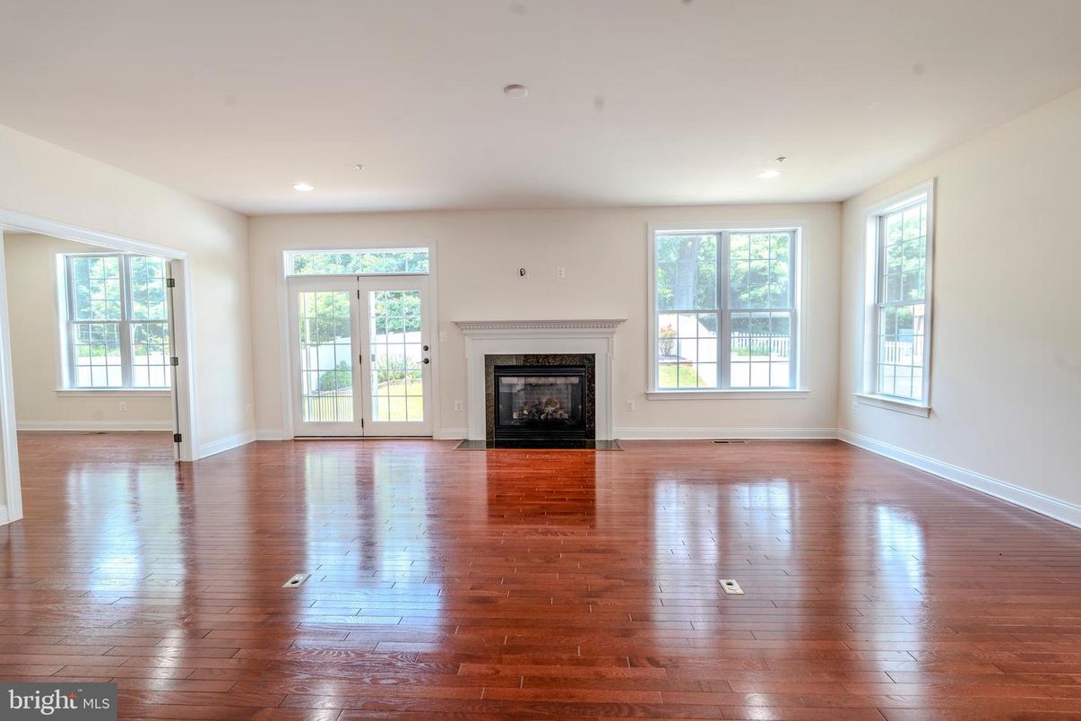 Empty room, Fireplace, Interior, Recessed Lighting, Wood Texture Flooring
