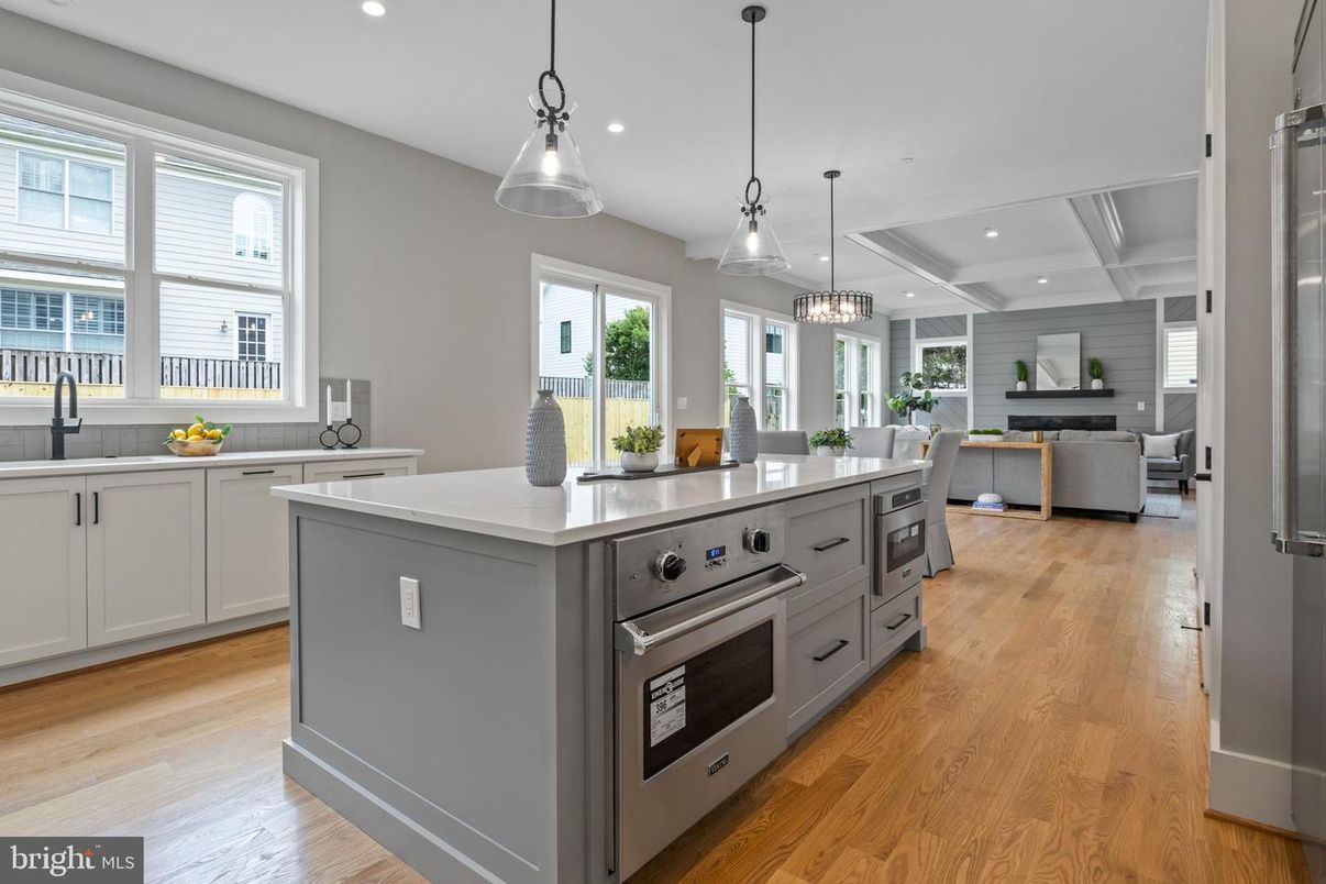 Dining room, Interior, Kitchen, Living room, Pendant Lights, Recessed Lighting, Stainless Steel Appliances, Wood Texture Flooring