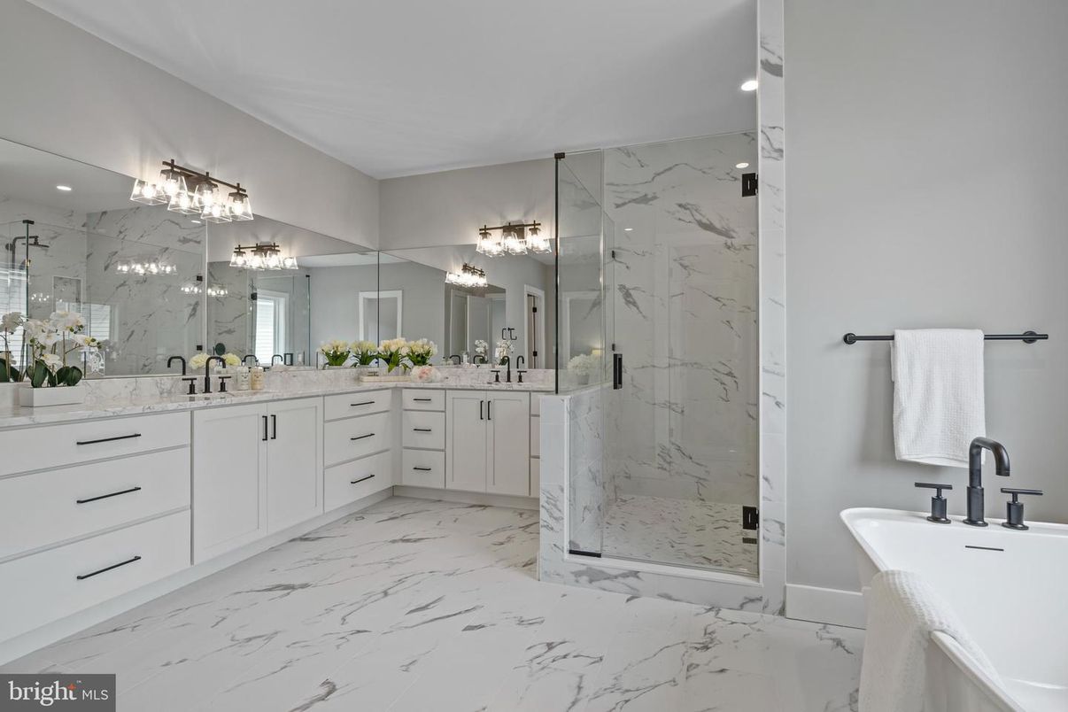 Bathroom, Dual Sink Vanities, Glass Shower, Interior, Marble, Marble Walls, Recessed Lighting