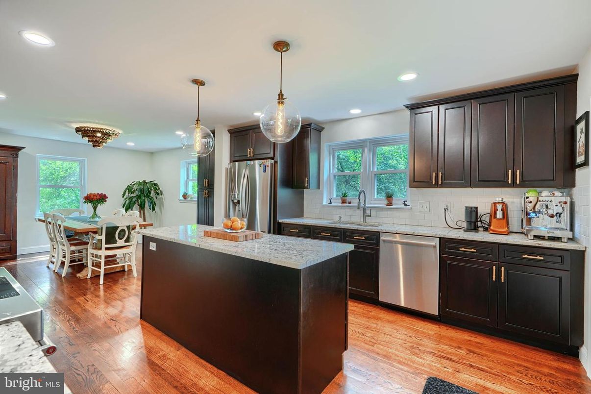 Dining room, Interior, Kitchen, Pendant Lights, Recessed Lighting, Stainless Steel Appliances, Wood Texture Flooring