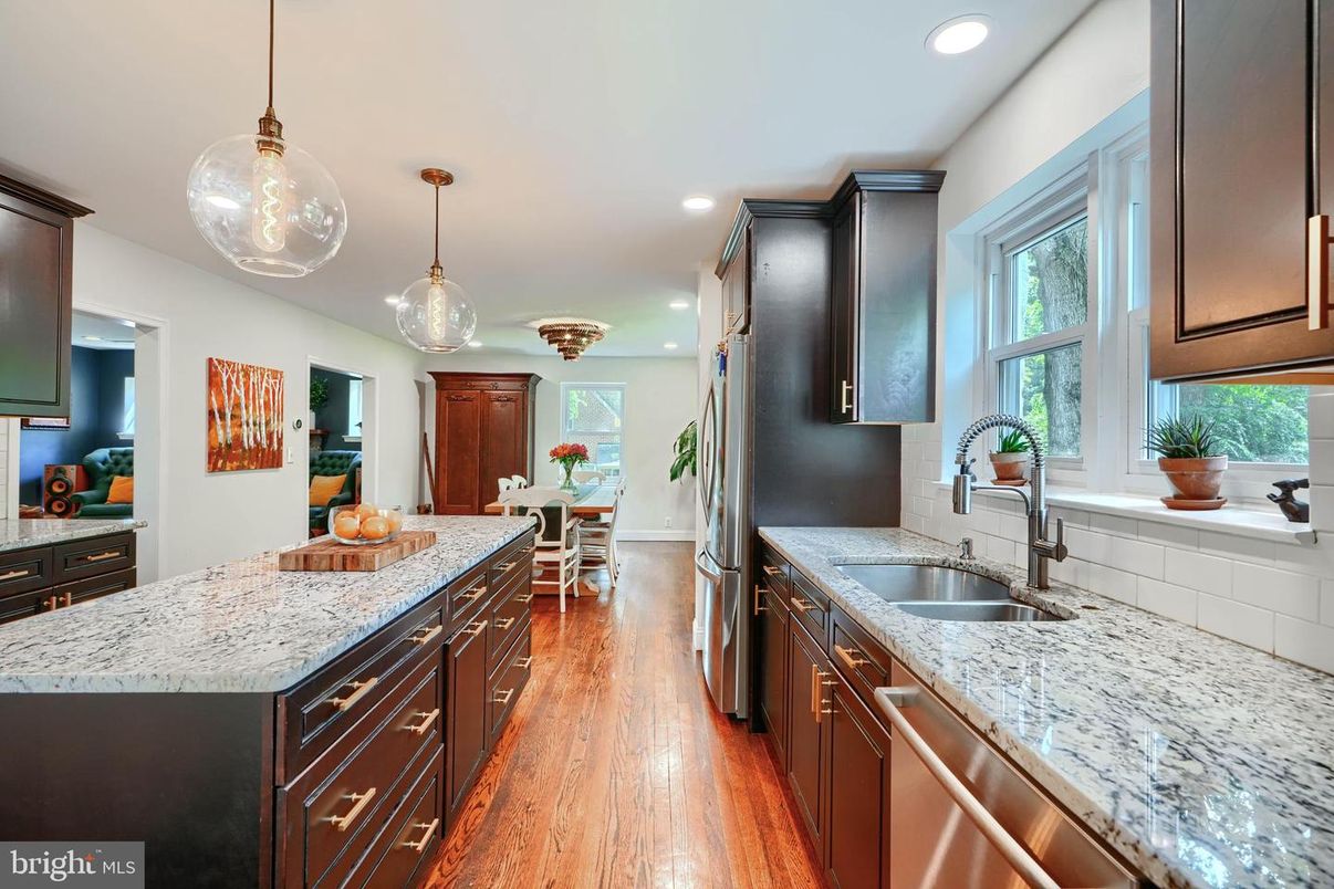 Dining room, Interior, Kitchen, Pendant Lights, Recessed Lighting, Stainless Steel Appliances, Wood Texture Flooring