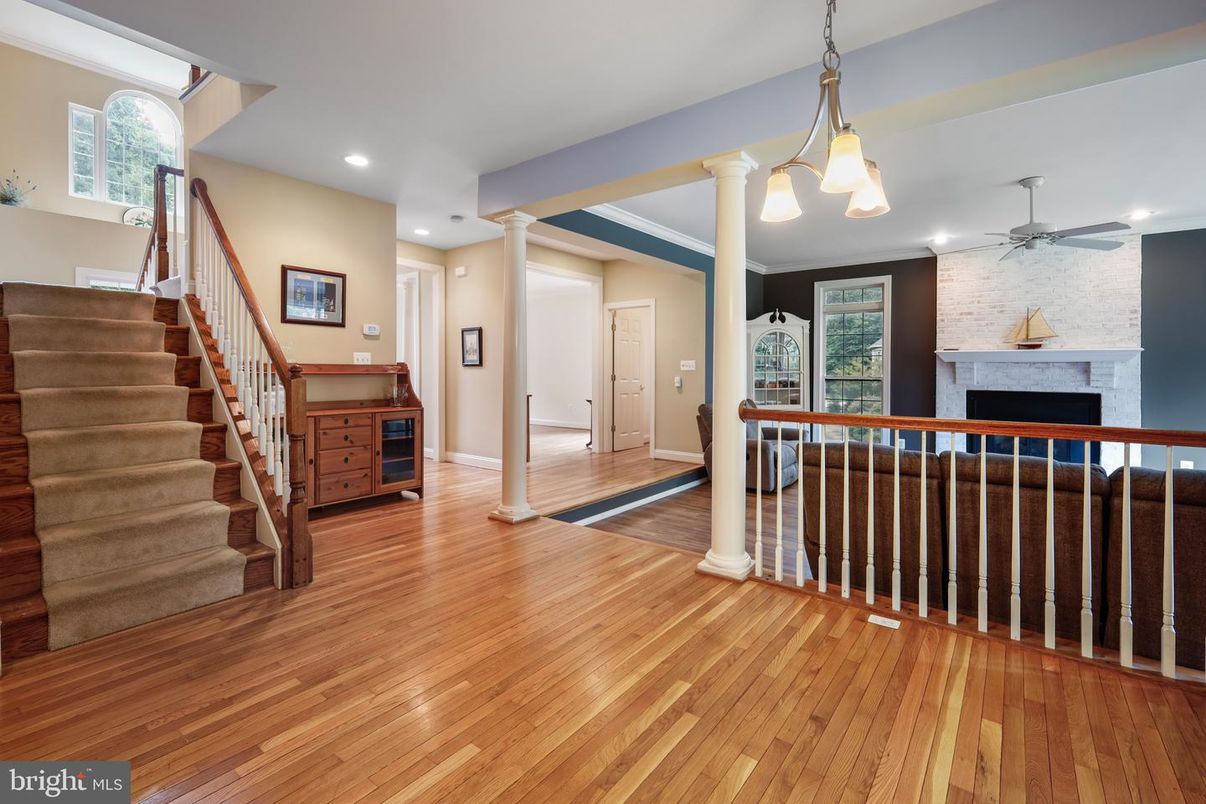Fireplace, Interior, Pendant Lights, Recessed Lighting, Stone Walls, Wood Texture Flooring