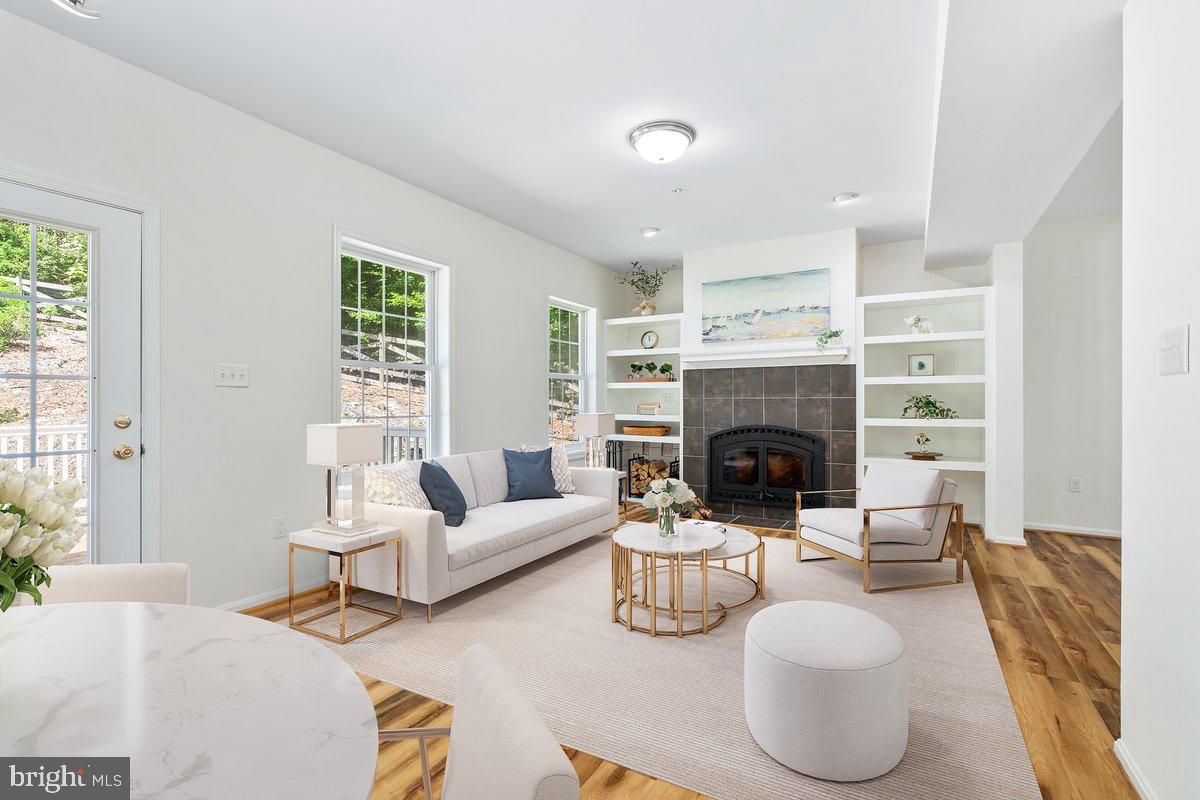 Dining room, Fireplace, Interior, Living room, Recessed Lighting, Wood Texture Flooring