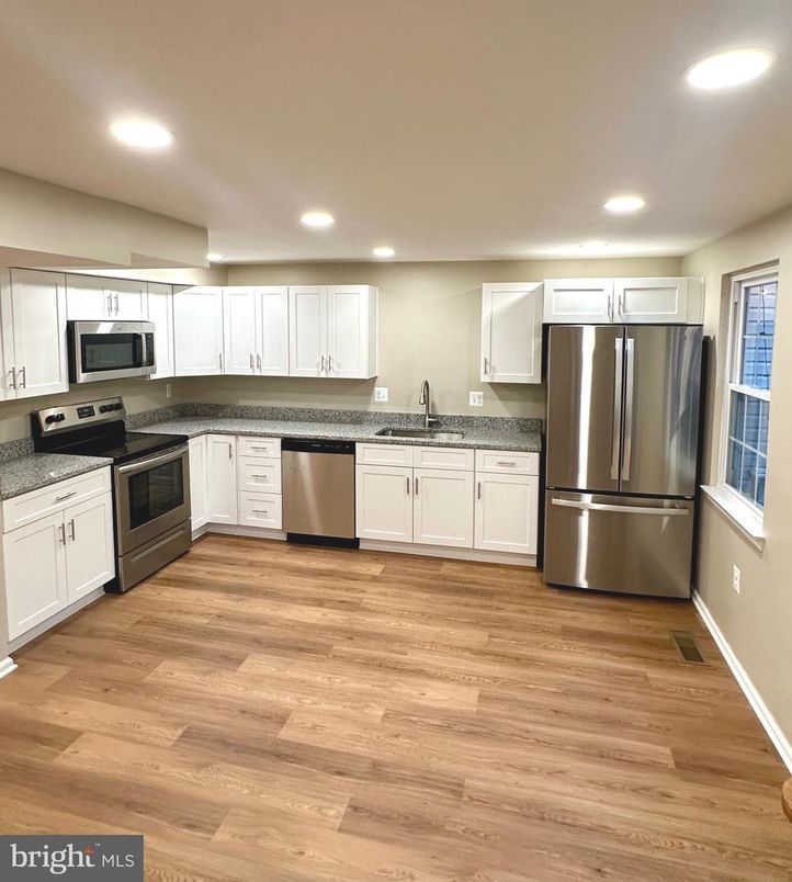 Interior, Kitchen, Recessed Lighting, Stainless Steel Appliances, Wood Texture Flooring