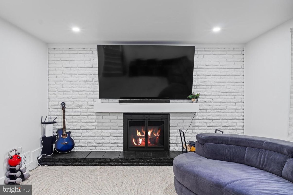 Fireplace, Fitness Equipment, Interior, Recessed Lighting, Stone Walls