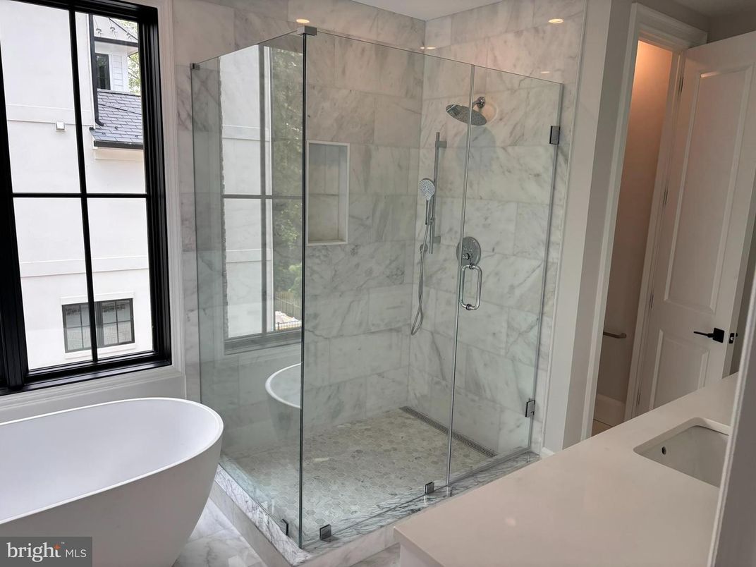 Bathroom, Free Standing Baths, Glass Shower, Interior, Marble, Marble Walls, Recessed Lighting