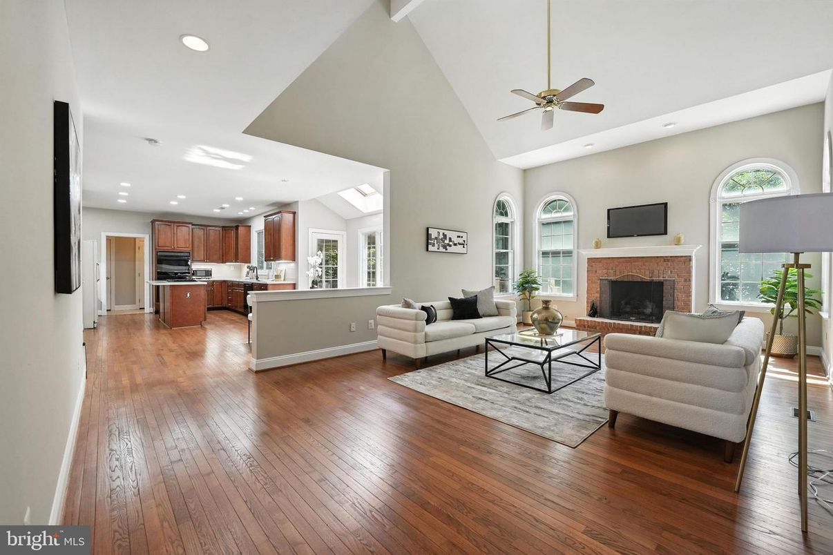 Fireplace, Interior, Kitchen, Living room, Recessed Lighting, Stainless Steel Appliances, Wood Texture Flooring