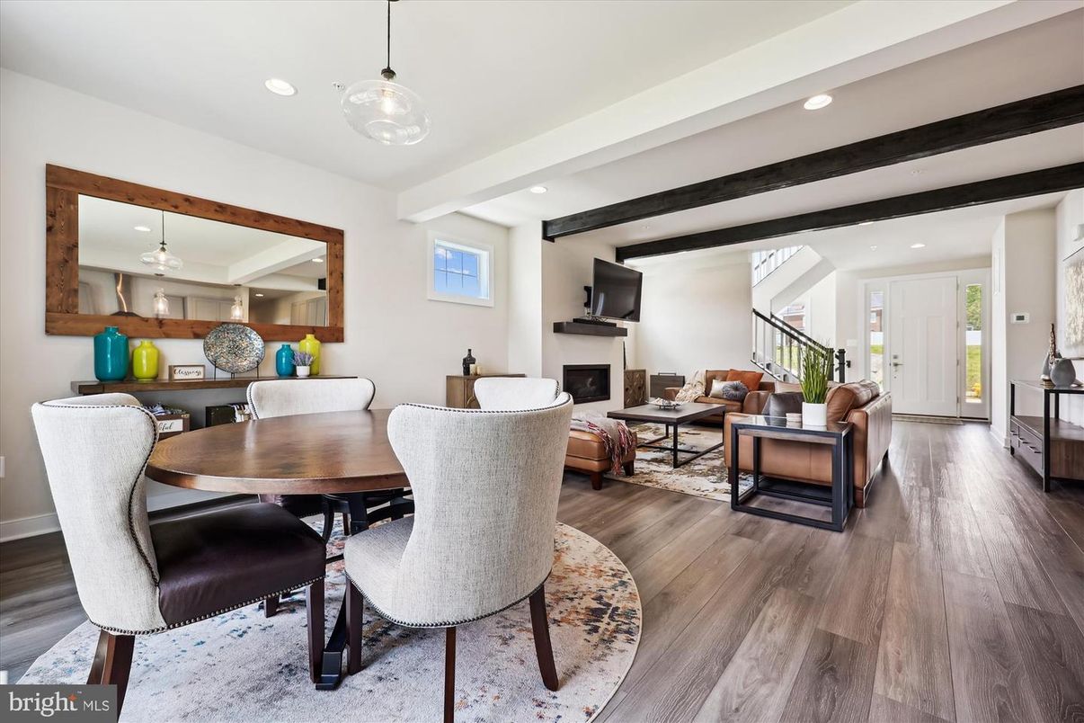 Dining room, Fireplace, Interior, Living room, Pendant Lights, Recessed Lighting, Wood Texture Flooring