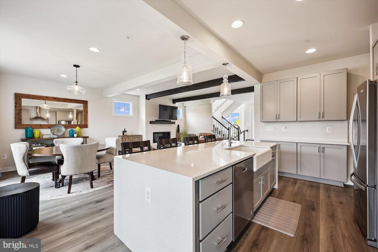 Dining room, Fireplace, Interior, Kitchen, Pendant Lights, Recessed Lighting, Stainless Steel Appliances, Wood Texture Flooring