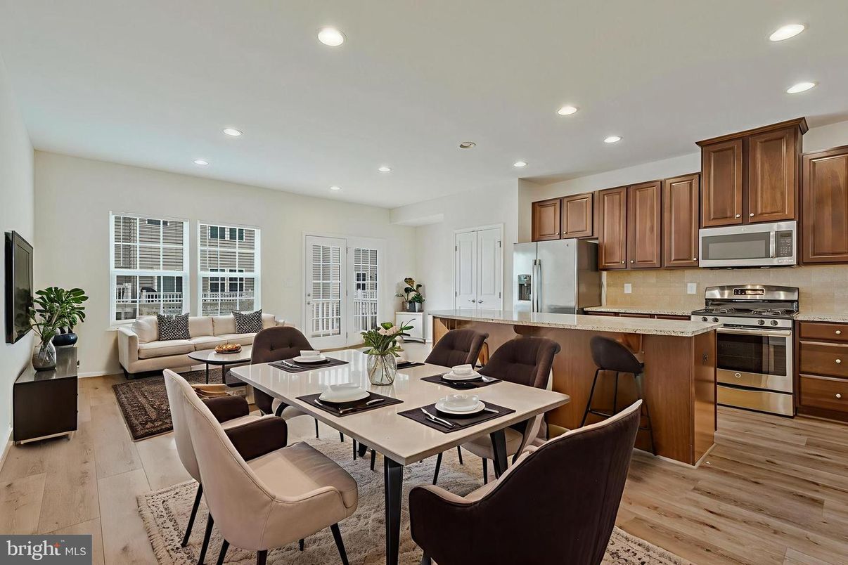 Dining room, Interior, Kitchen, Living room, Recessed Lighting, Stainless Steel Appliances, Wood Texture Flooring