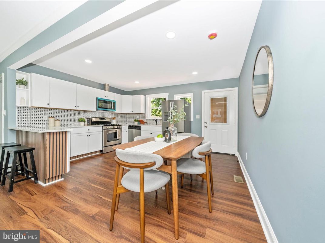 Dining room, Interior, Kitchen, Recessed Lighting, Stainless Steel Appliances, Wood Texture Flooring