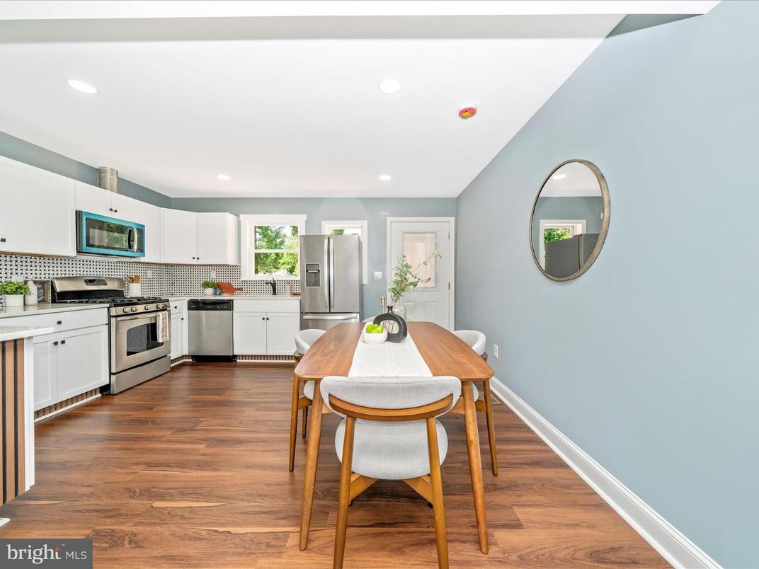 Dining room, Interior, Kitchen, Recessed Lighting, Stainless Steel Appliances, Wood Texture Flooring
