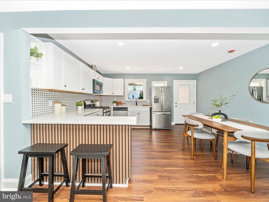 Dining room, Interior, Kitchen, Recessed Lighting, Stainless Steel Appliances, Wood Texture Flooring