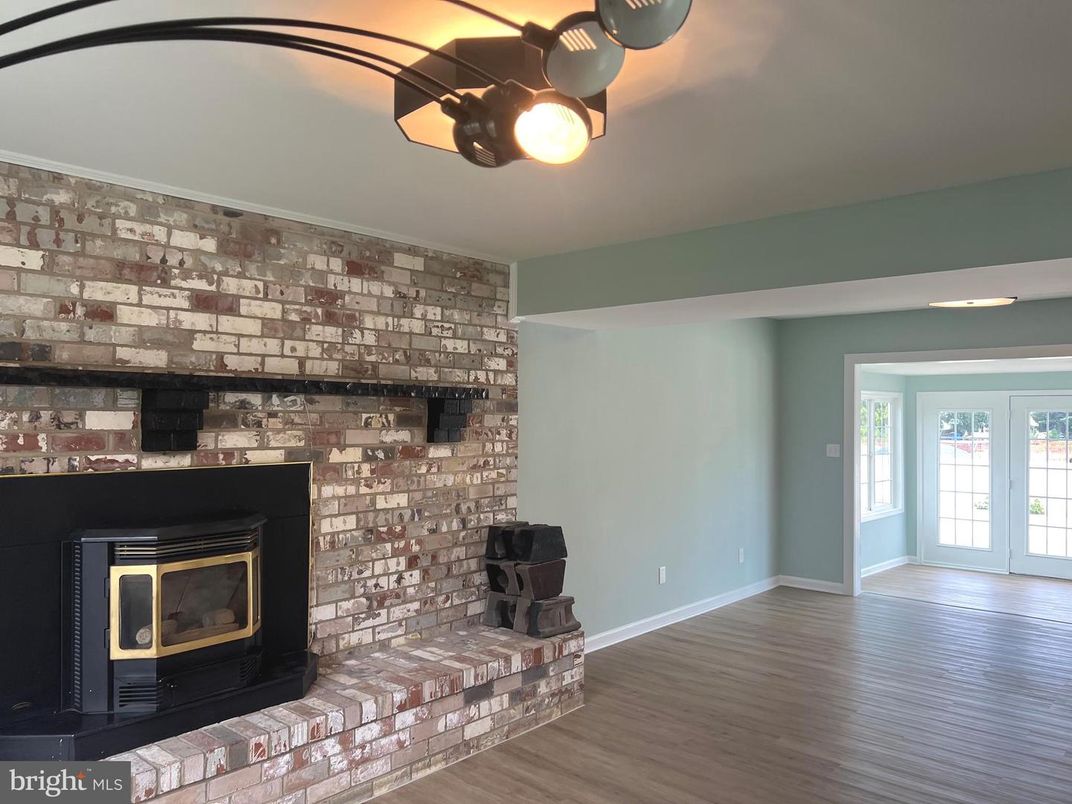Empty room, Fireplace, Interior, Stone Walls, Wood Texture Flooring