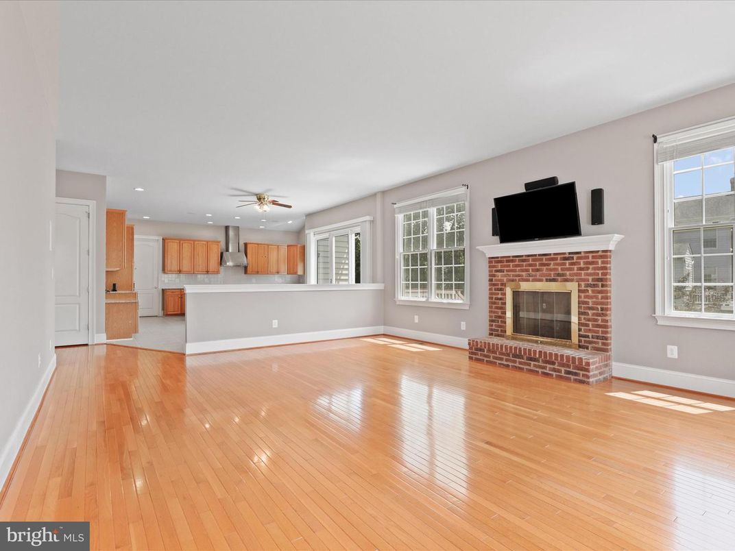 Empty room, Fireplace, Interior, Kitchen, Recessed Lighting, Wood Texture Flooring