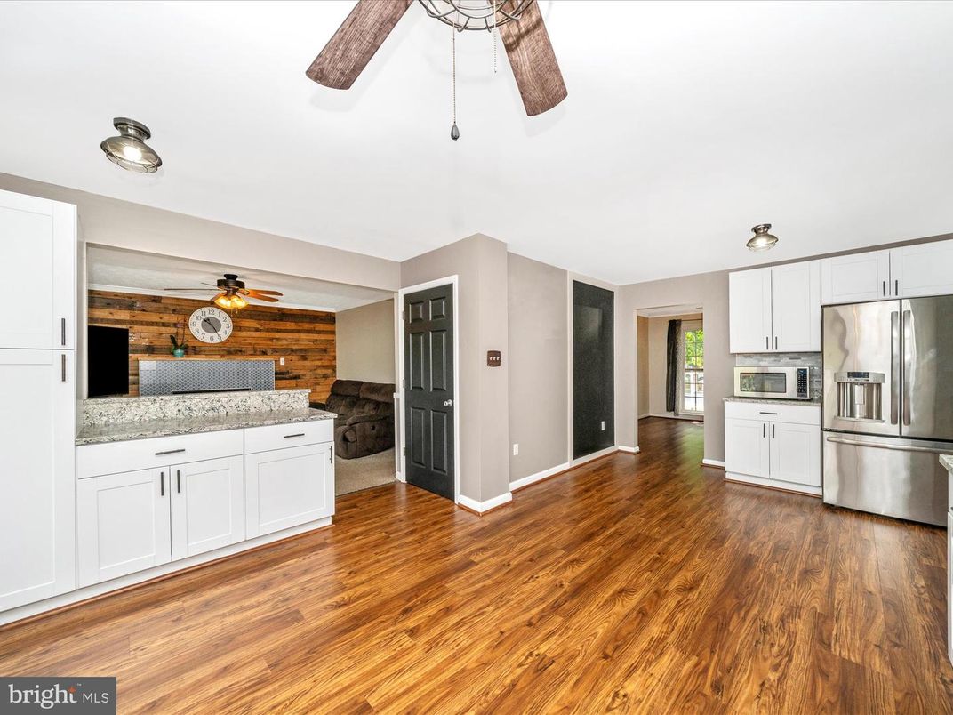 Interior, Kitchen, Stainless Steel Appliances, Stone Walls, Wood Texture Flooring