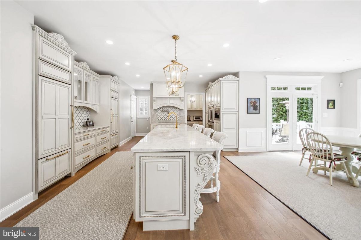 Chandelier, Dining room, Interior, Kitchen, Pendant Lights, Recessed Lighting, Stainless Steel Appliances, Wood Texture Flooring