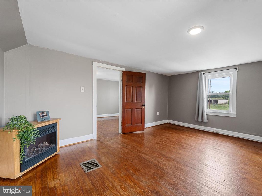 Empty room, Fireplace, Interior, Recessed Lighting, Wood Texture Flooring