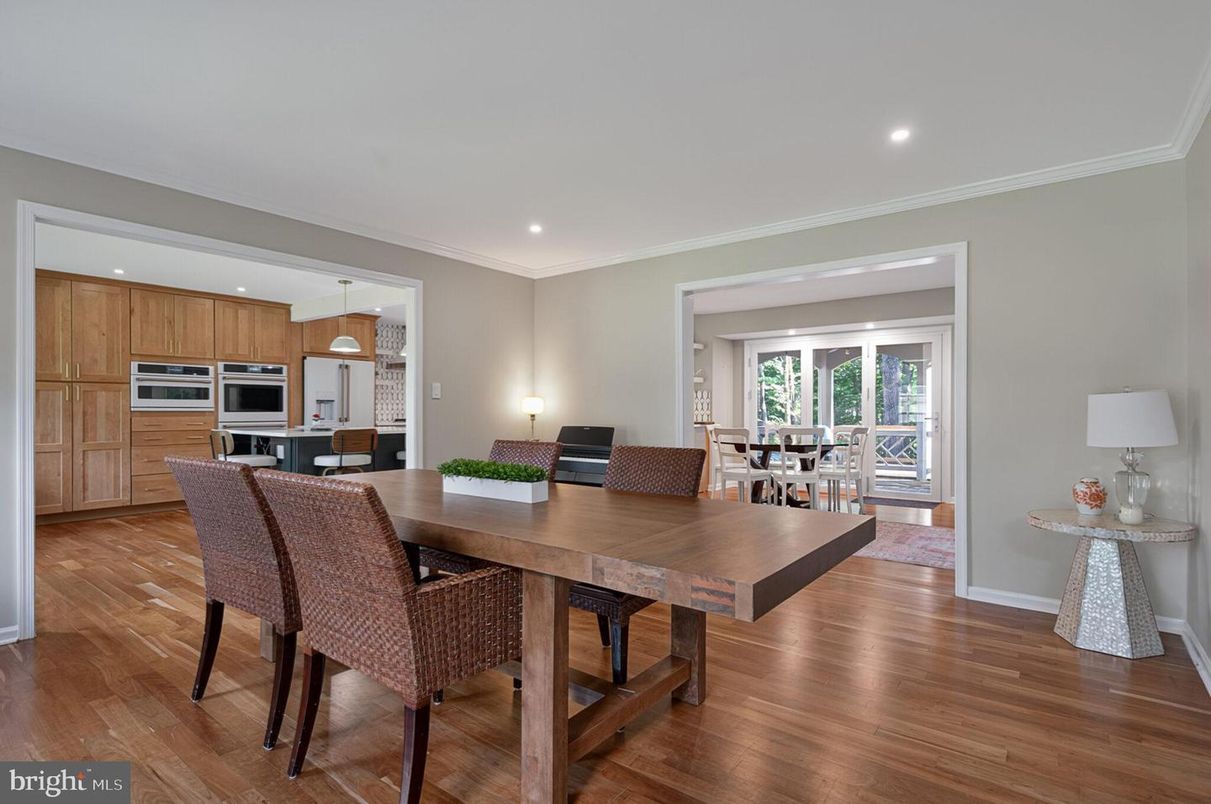 Dining room, Interior, Kitchen, Pendant Lights, Recessed Lighting, Stainless Steel Appliances, Wood Texture Flooring