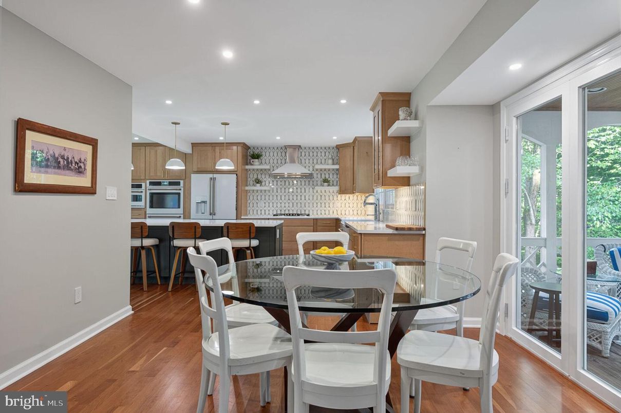 Dining room, Interior, Kitchen, Pendant Lights, Recessed Lighting, Stainless Steel Appliances, Wood Texture Flooring