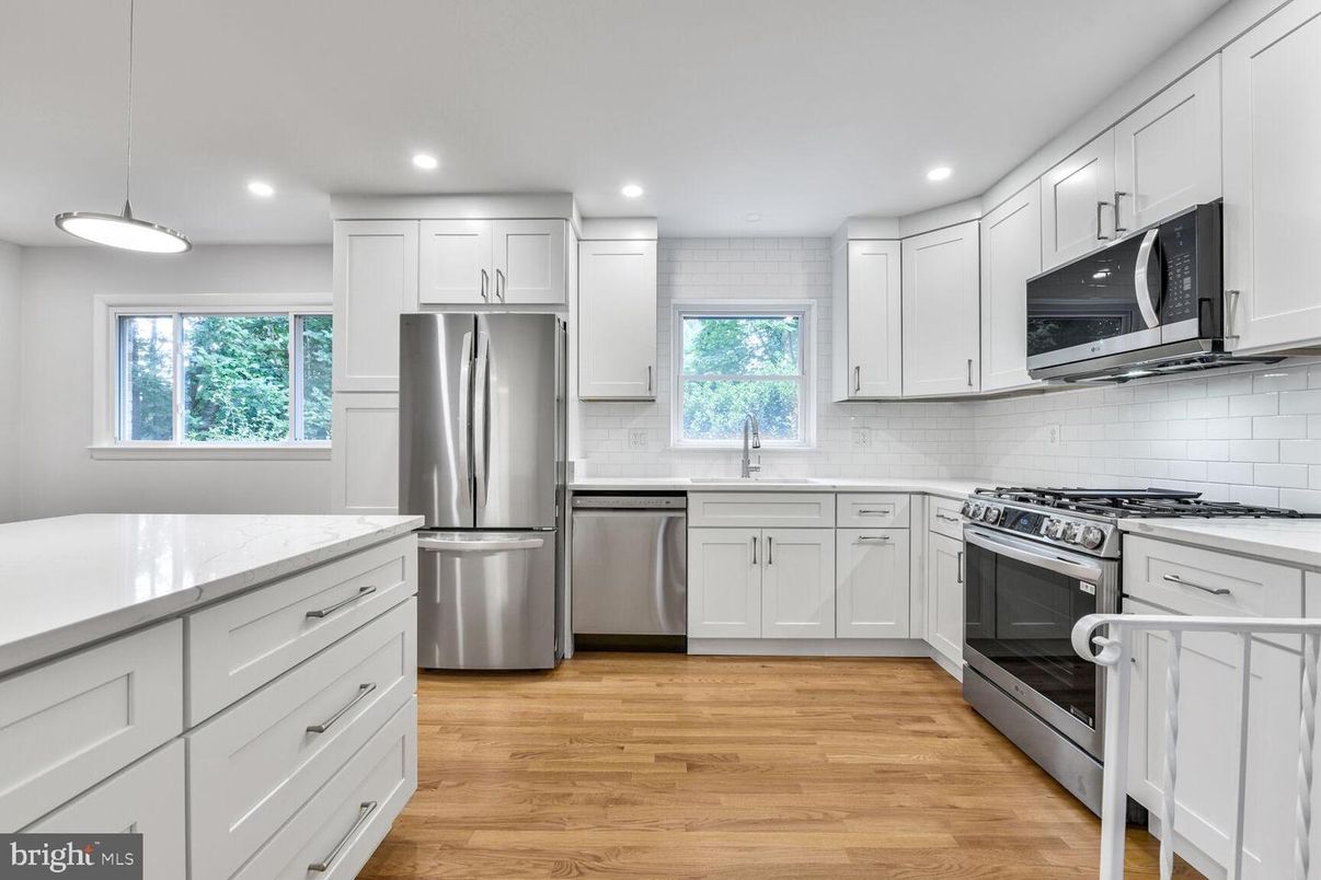 Interior, Kitchen, Pendant Lights, Recessed Lighting, Stainless Steel Appliances, Wood Texture Flooring