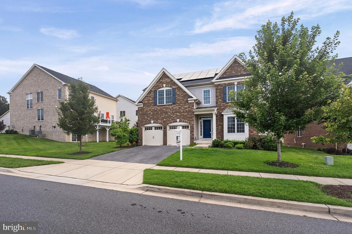 Attached, Exterior, Facade, Solar Panels, Tudor Revival