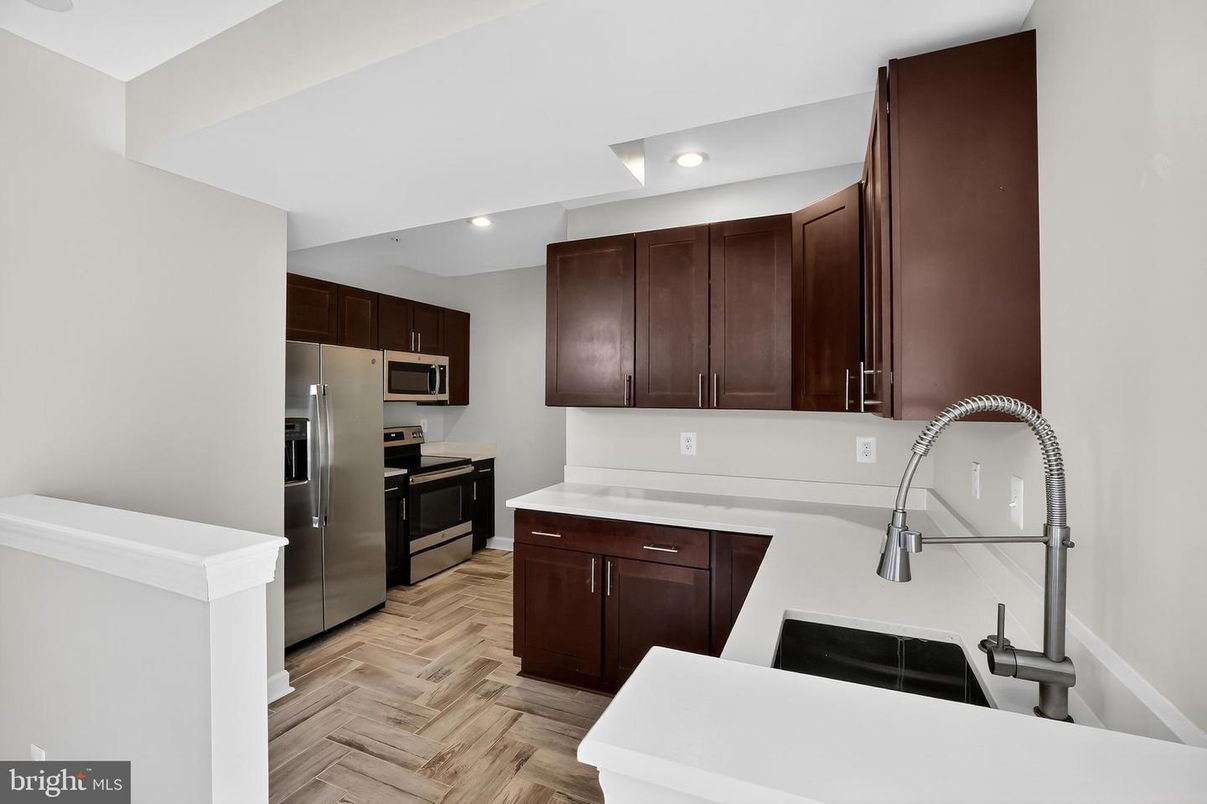 Interior, Kitchen, Recessed Lighting, Stainless Steel Appliances, Wood Texture Flooring