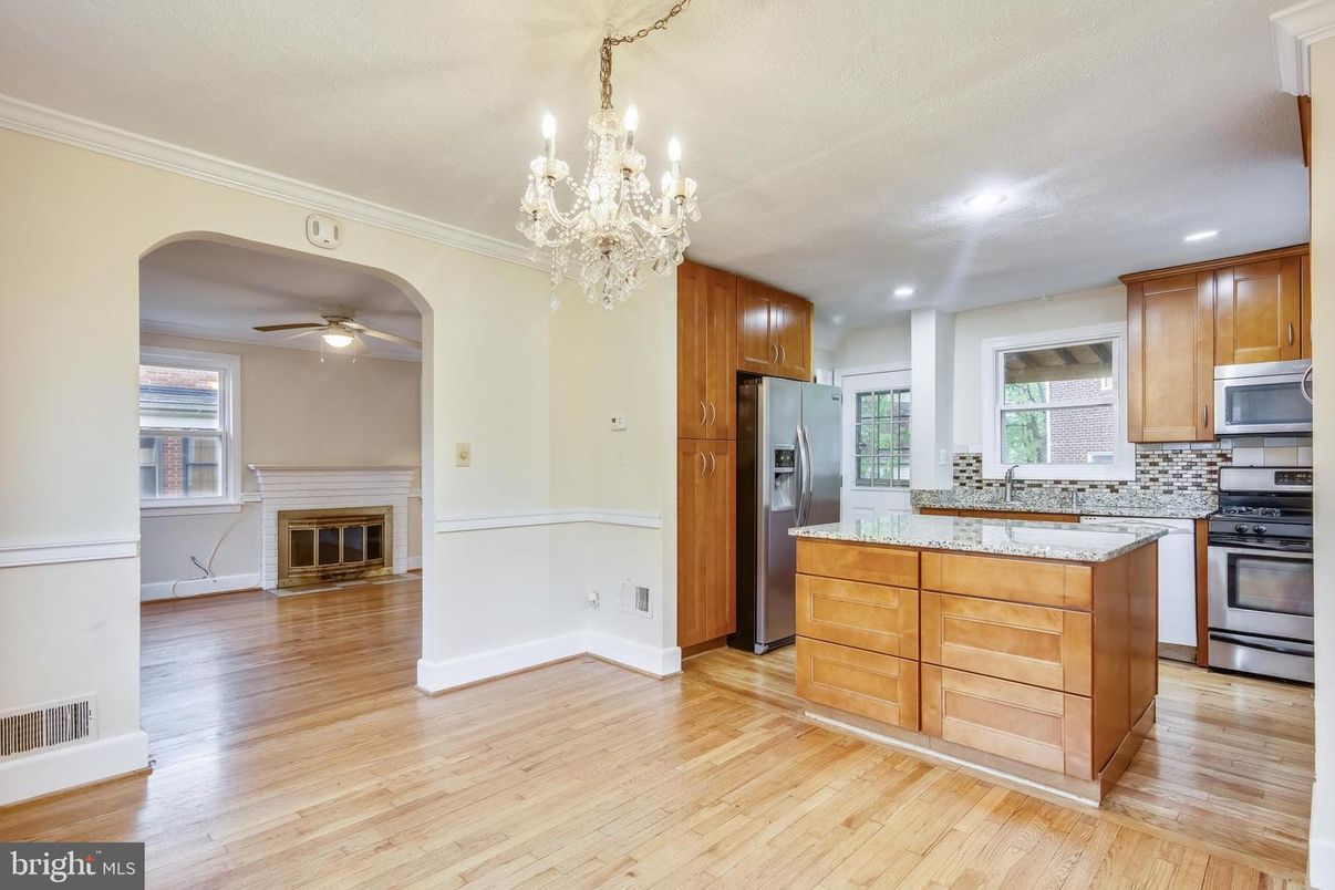 Chandelier, Fireplace, Interior, Kitchen, Recessed Lighting, Wood Texture Flooring
