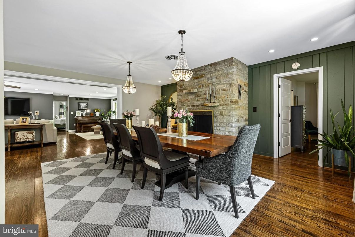 Dining room, Fireplace, Interior, Pendant Lights, Recessed Lighting, Stone Walls, Wood Texture Flooring
