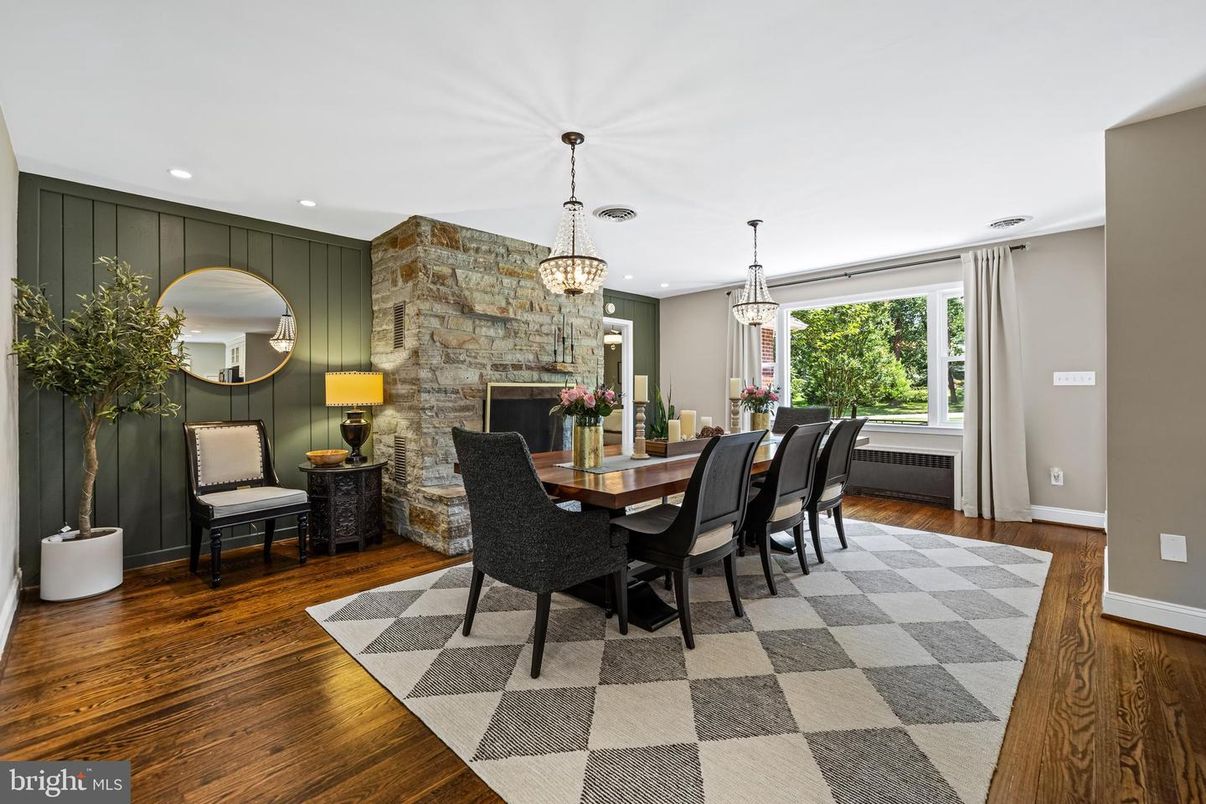 Chandelier, Dining room, Fireplace, Interior, Pendant Lights, Recessed Lighting, Stone Walls, Wood Texture Flooring