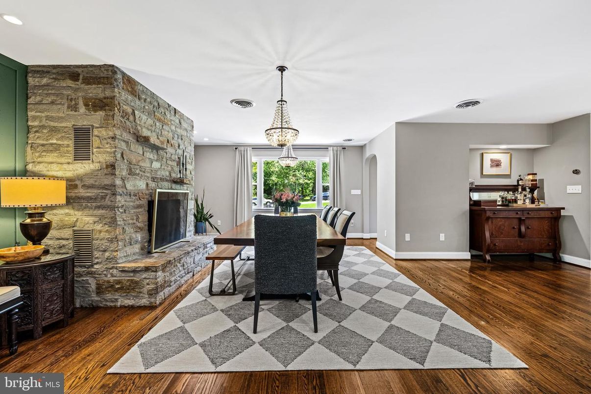 Dining room, Fireplace, Interior, Pendant Lights, Recessed Lighting, Stone Walls, Wood Texture Flooring