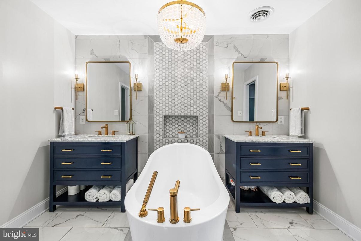 Bathroom, Chandelier, Dual Sink Vanities, Free Standing Baths, Interior, Marble, Marble Walls