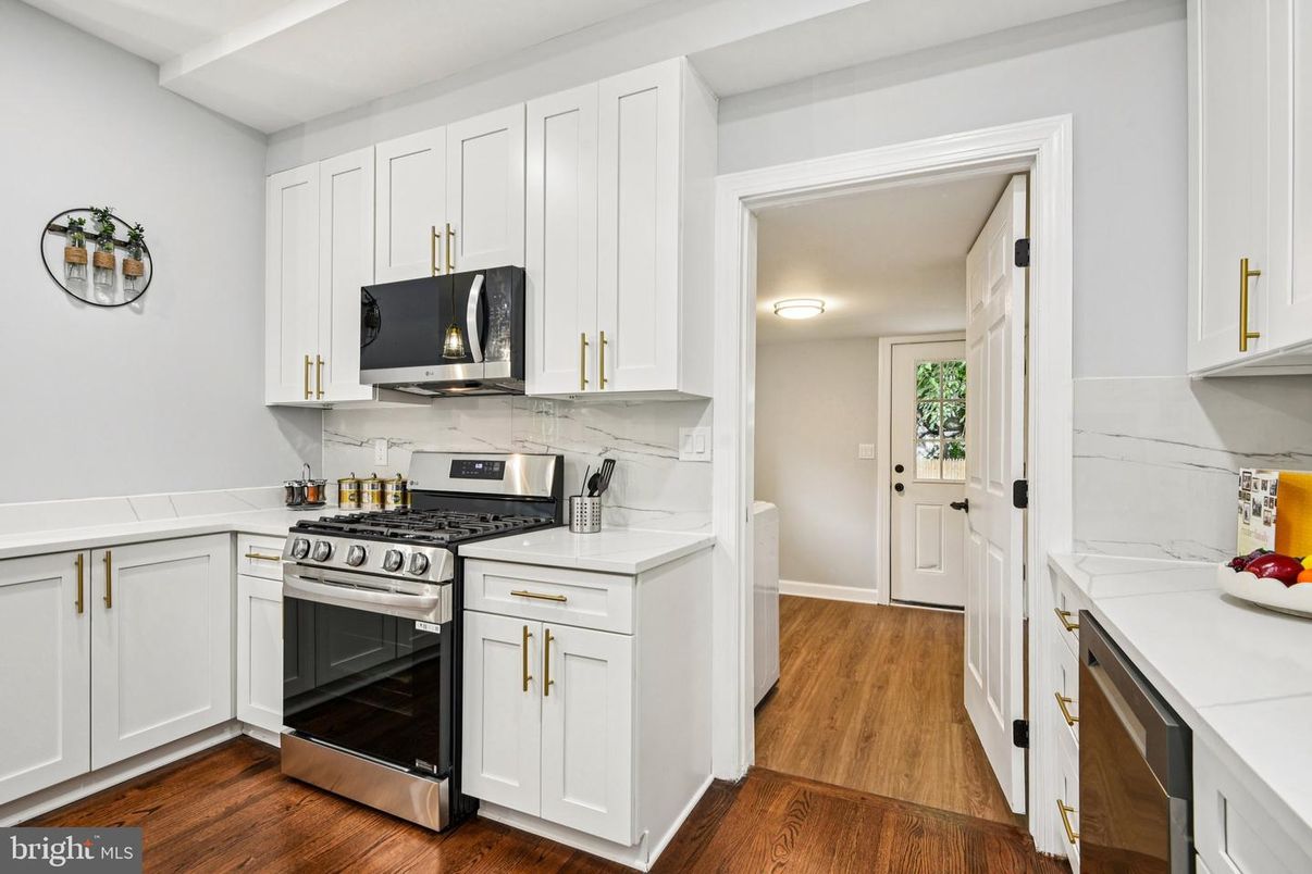 Interior, Kitchen, Marble Walls, Stainless Steel Appliances, Wood Texture Flooring