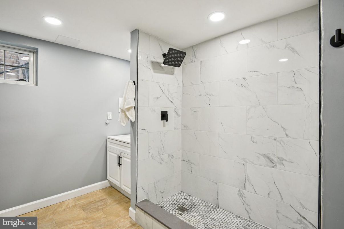 Bathroom, Glass Shower, Interior, Marble Walls, Recessed Lighting, Wood Texture Flooring