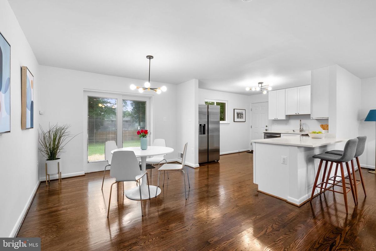 Dining room, Interior, Kitchen, Pendant Lights, Stainless Steel Appliances, Wood Texture Flooring