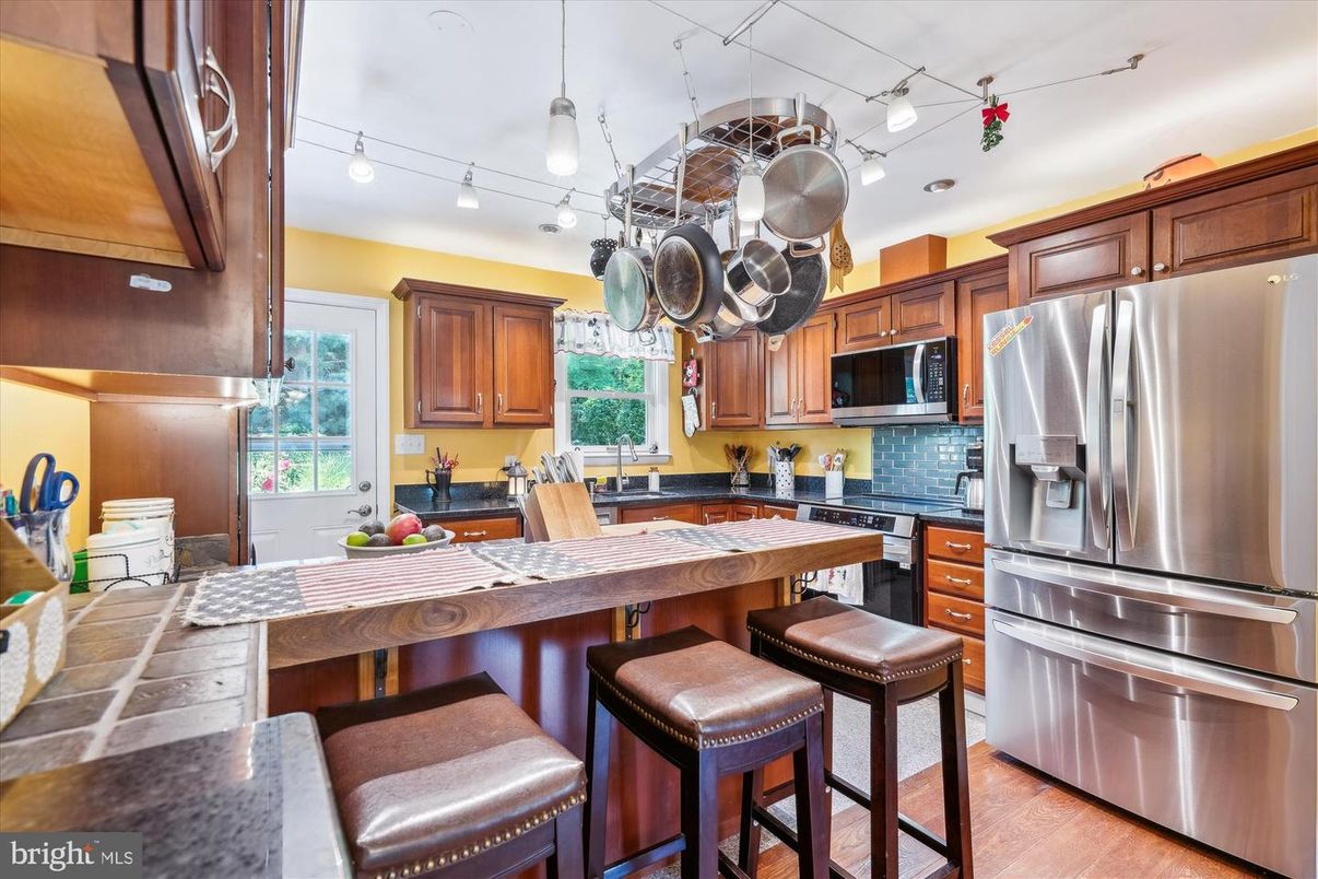Interior, Kitchen, Stainless Steel Appliances, Tile Countertops, Wood Texture Flooring