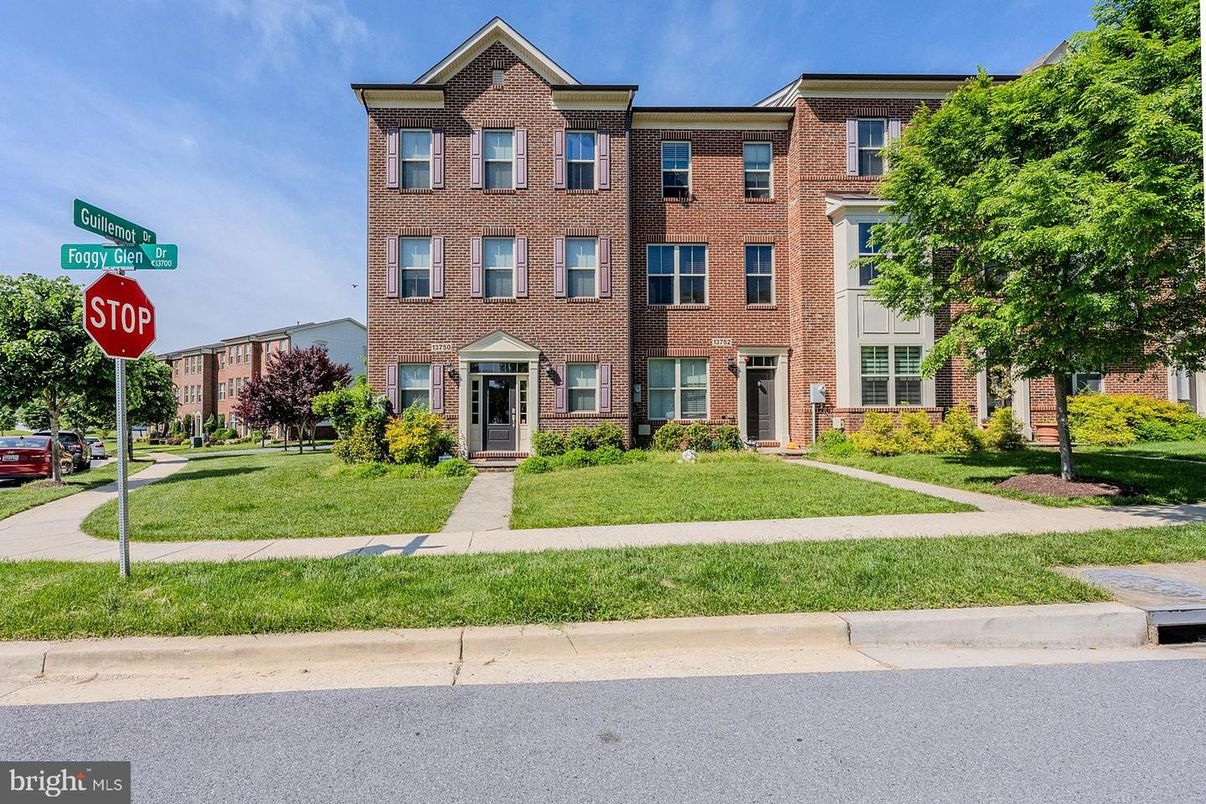 Exterior, Facade, Brick Facade, Condo Building